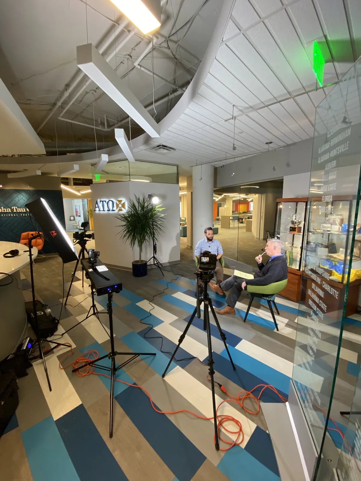 A Bone Hook Media production set with colorful mural backdrop